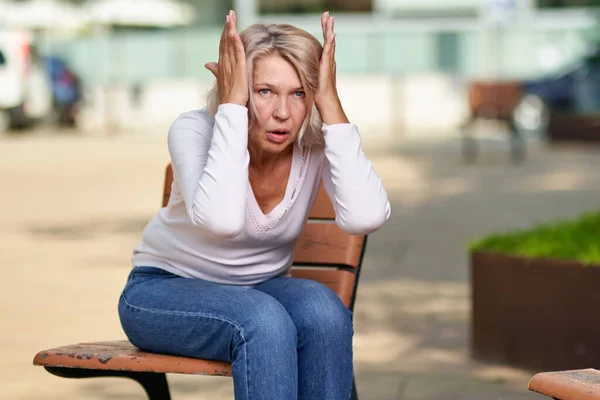 Woman Suffering Headache Stress Holding Her Hands Her Temples Street — Stock Photo, Image