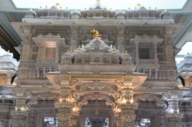 ROBBINSVILLE, NJ - JUL 28: The Akshardham temple in Robbinsville, New Jersey, as seen on July 28, 2018. It is planned to be spread over 162 acres, making it the largest Hindu temple in the world in terms of acreage. clipart
