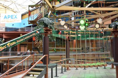 SYRACUSE, NY - MAY 11: Canyon Climb ropes course at Destiny USA shopping and entertainment complex in Syracuse, New York, as seen on May 11, 2019. It is the largest mall in New York state. clipart
