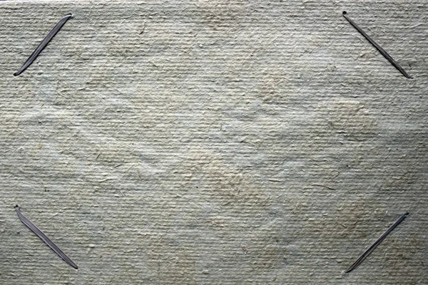 Fotoğraf çerçevesi olarak bitkilerin lifleri ve iplikleriyle kabataslak karton arkaplanı