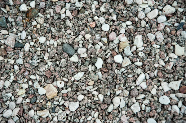 花崗岩と小石の小さなイーメンの写真の背景 — ストック写真