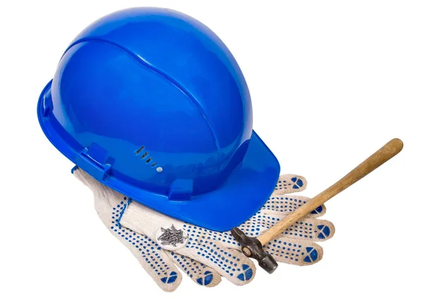 Голубые перчатки шлем молоток и ногти изолированы на белом фоне — стоковое фото