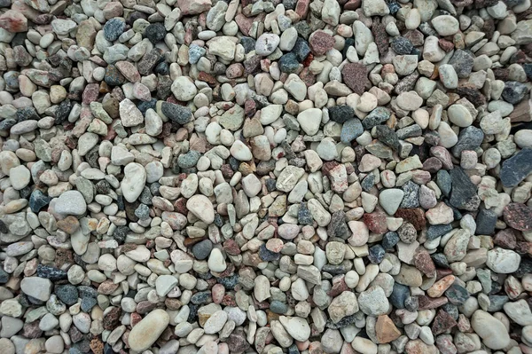 Photo background of small eamens of granite and pebbles — Stock Photo, Image