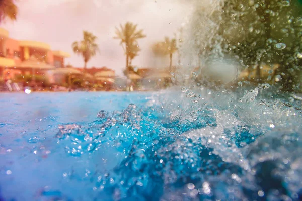 The swimming pool with waterfall — Stock Photo, Image