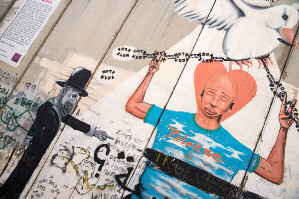 BETHLEHEM, PALESTINE - JUNE 2, 2015: The Israeli West Bank barrier  is a separation barrier. Upon completion, its total length will be about 700 kilometres.