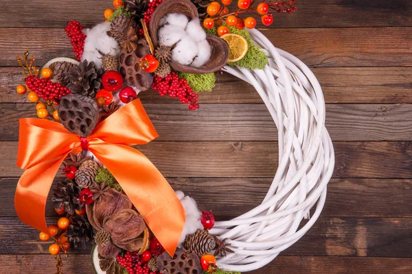 Christmas wreath on a wooden  background — Stock Photo, Image