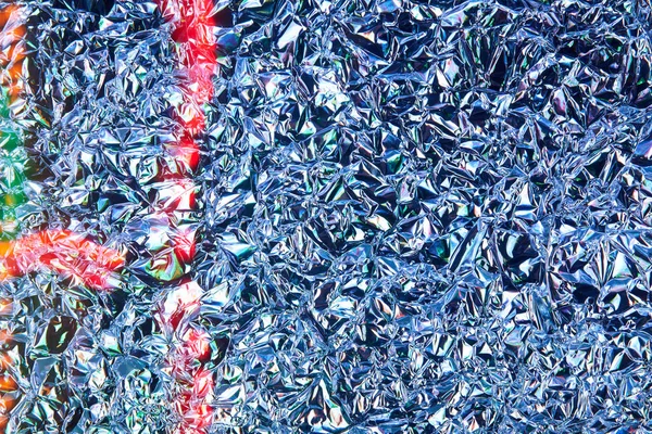 Скомканная фольга, абстрактный фон — стоковое фото