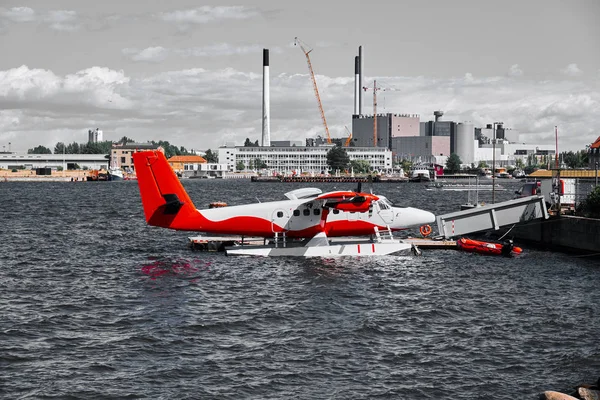 Red plane on the water — Stock Photo, Image