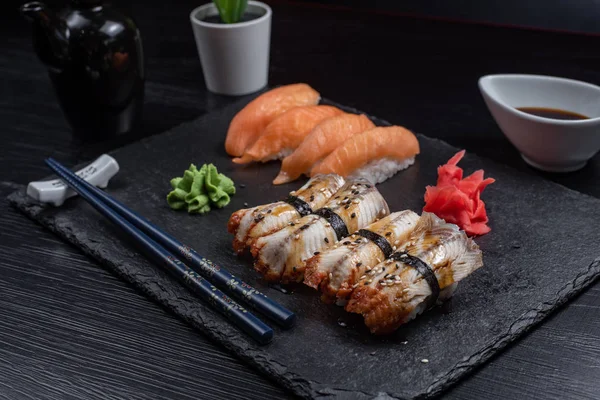 Sushi Set sashimi and sushi rolls served Stock Photo