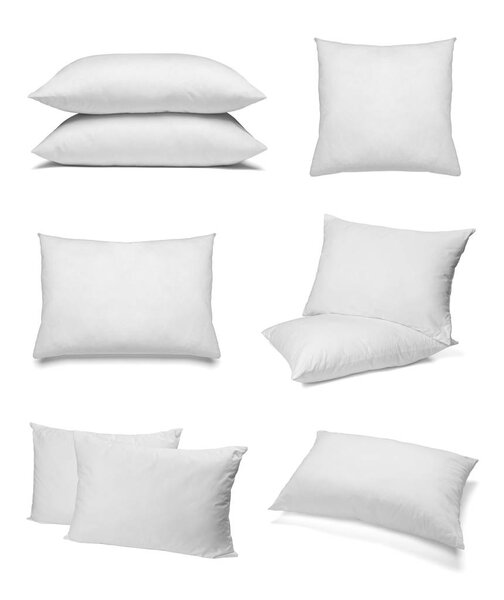 collection of various white pillows on white background. each one is shot separately