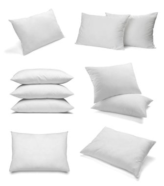 Beyaz arka plan üzerinde çeşitli beyaz yastıklar topluluğu. her biri ayrı ayrı vurulur
