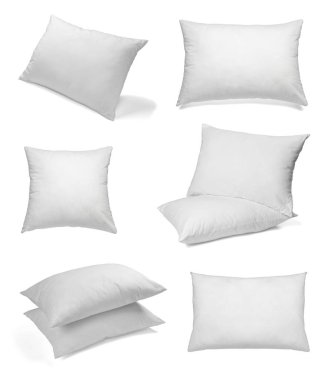 Beyaz arka plan üzerinde çeşitli beyaz yastıklar topluluğu. her biri ayrı ayrı vurulur