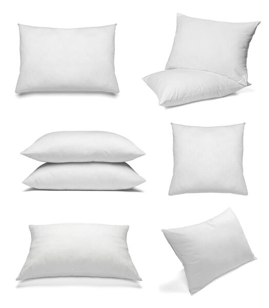 collection of various white pillows on white background. each one is shot separately