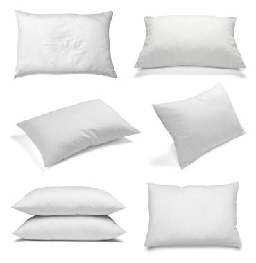 Beyaz arka plan üzerinde çeşitli beyaz yastıklar topluluğu. her biri ayrı ayrı vurulur