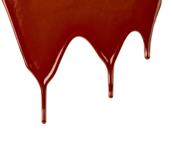 Close Van Chocolade Siroop Lekken Witte Achtergrond — Stockfoto