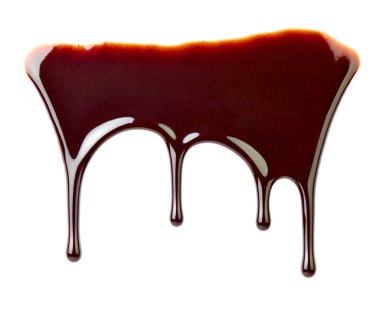 çikolata şurubu beyaz arka plan üzerinde sızıntı yakın çekim