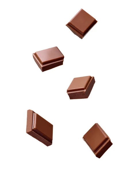 Close Chocolate Pieces Stack Falling White Background — Stock Photo, Image