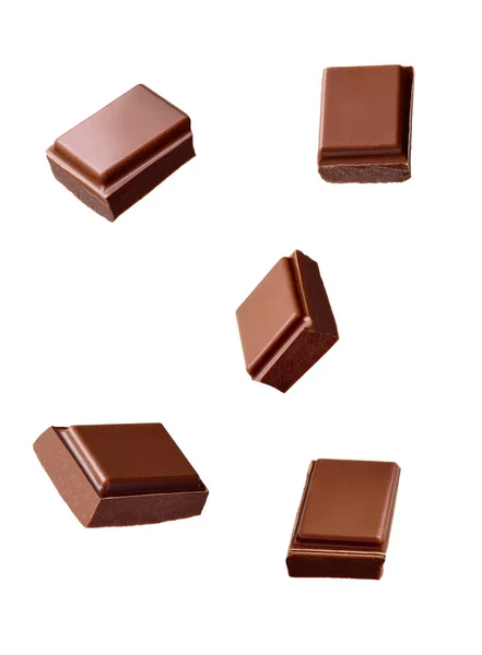 Close Chocolate Pieces Stack Falling White Background — Stock Photo, Image