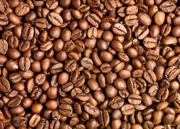 Närbild Kaffebönor Bildar Bakgrund — Stockfoto