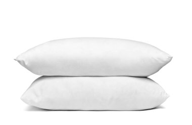 Beyaz arka plandaki beyaz yastığı kapat