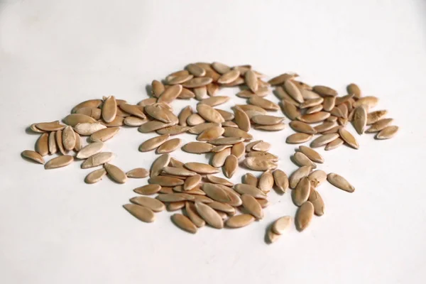 Dried Melon Seeds on white background