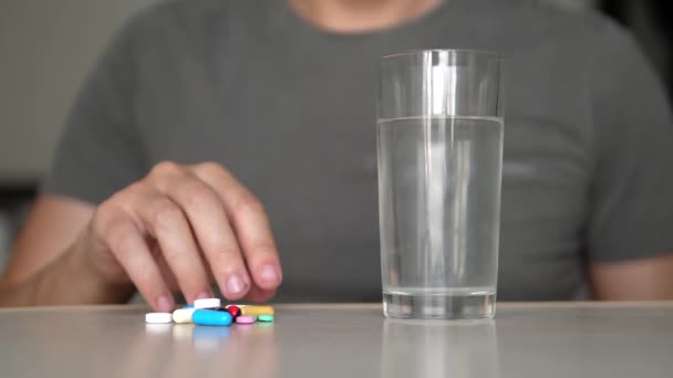 Man Taking Pills At Home Is Ill Sick Slow Motion Healthcare And Medical Concept Man Taking Pills At Home Is Ill Sick Slow Motion Healthcare And Medical Concept