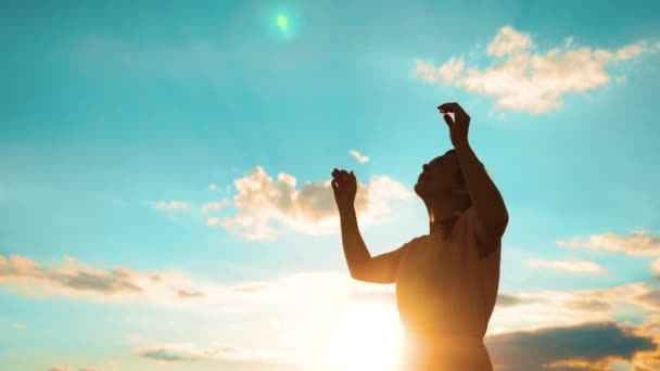 Woman praying on her knees. Girl folded her hands lifestyle in prayer