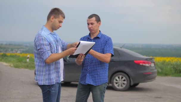 two men make a deal. man seller driver makes car the auto insurance slow motion video. man sale sells used cars. car insurance sale of used lifestyle cars concept. Buying rent a car