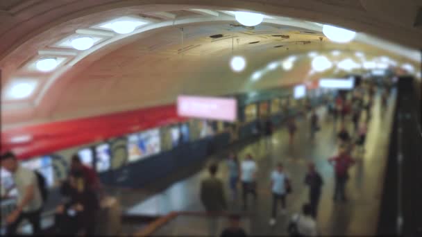 People crowd subway underground metro. Blurred people on subway platform leaving the train. Blur of crowd of people in the train rush hour. underground metro concept lifestyle — Stock Video