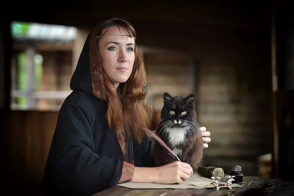 Woman Medieval Cloak Sits Pen Writes Black Cat — Stock Photo, Image