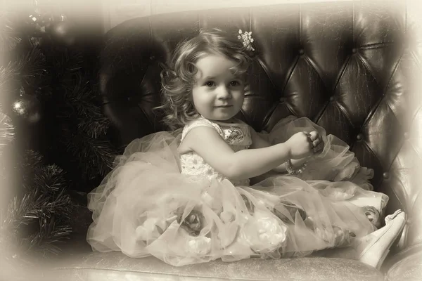 Cute Little Girl Leather Sofa Christmas — Stock Photo, Image