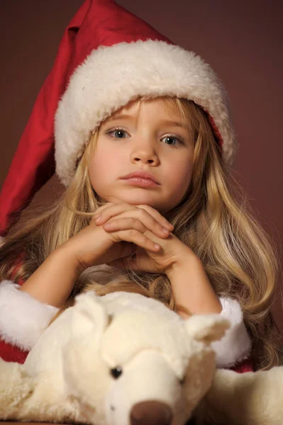 Portret Van Een Mooie Blonde Kind Een Kerstmuts — Stockfoto