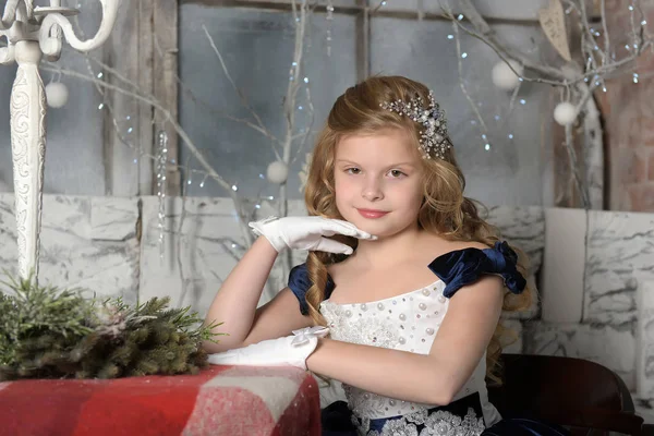 Beautiful Blonde Curls Blue Dress Sitting Table Christmas — Stock Photo, Image