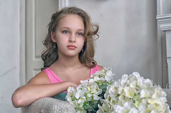 Portrait Girl Years Old Blonde Curls Sitting Chair Flowers — Stock Photo, Image