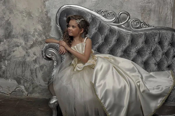 Young Victorian Princess Sitting Silver Sofa White Dress — Stock Photo, Image