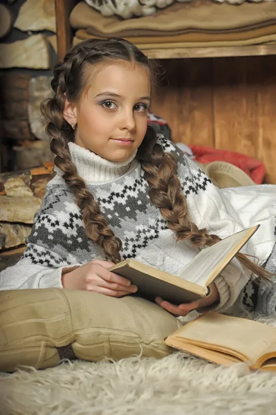 Girl Braids Sweater Lies Plaid Book — Stock Photo, Image