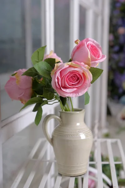 White jug with pink roses — Stock Photo, Image