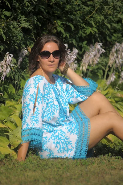 Young Woman Blue Dress Sunglasses Summer Park Flower Garden — Stock Photo, Image