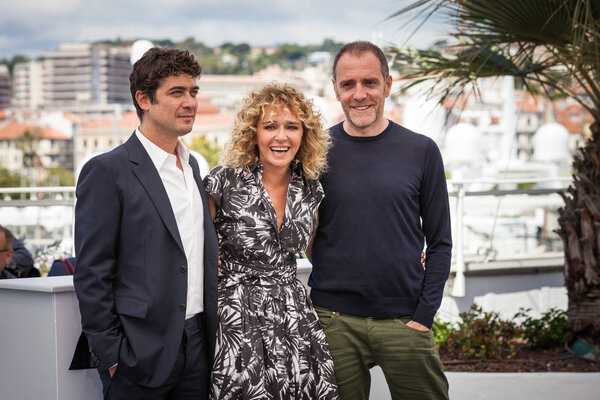 CANNES, FRANCE - MAY 15, 2018: Riccardo Scamarcio, director Valeria Golino and Valerio Mastandrea attend the photocall for 'Euforia' during the 71st annual Cannes Film Festival