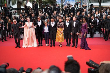 CANNES, FRANCE - MAY 14, 2019: Jury Members Yorgos Lanthimos, Enki Bilal, Alice Rohrwacher, Kelly Reichardt, Pawel Pawlikowski,  Alejandro Gonzalez Inarritu and Elle Fanning, wearing chopard attend the opening ceremony and screening of 