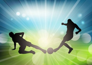 Futbol ya da futbol oyuncu siluetleri defocussed bir arka plan üzerinde
