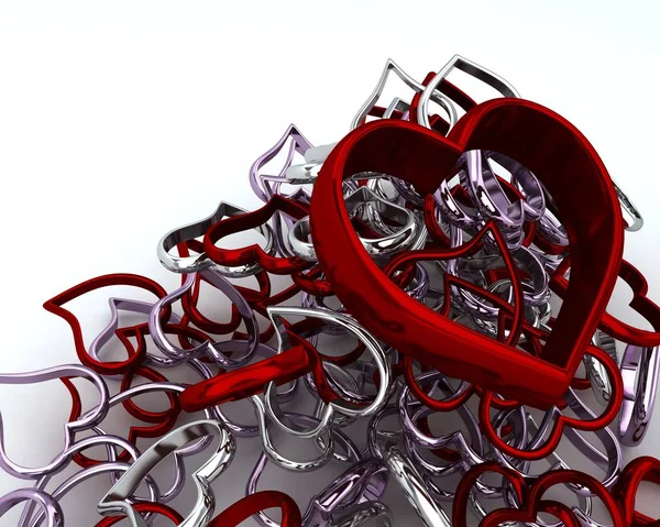 Chrome heart charms — Stock Photo, Image