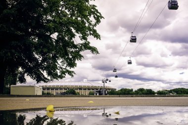 Aerial funicular cableway between Luzhniki stadium and Sparrow Hills (Vorobyovy Gory) over the Moskva River  in summer. Cable car in Moscow, Russia.  clipart