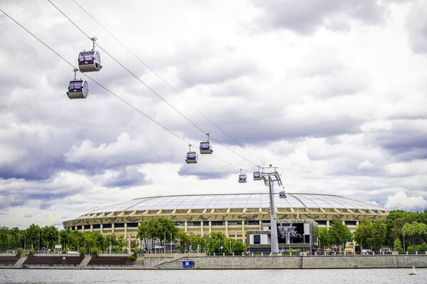 Aerial funicular cableway between Luzhniki stadium and Sparrow Hills (Vorobyovy Gory) over the Moskva River  in summer. Cable car in Moscow, Russia. 