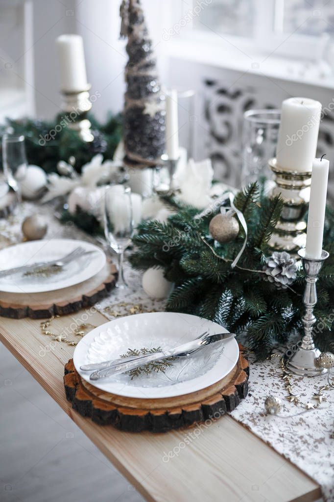 Table served for Christmas dinner in living room, close up view