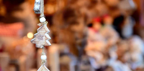 Handmade decorations made of natural materials for sale at the Merano Christmas market in South Tyrol