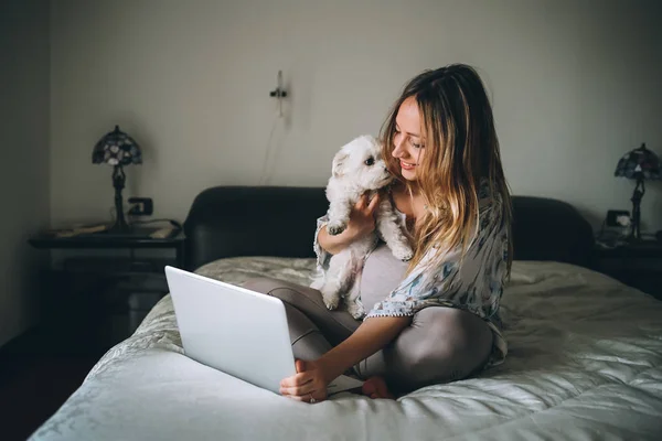 Young Woman Indoors Home Sitting Bed Using Laptop Computer Holding — 图库照片