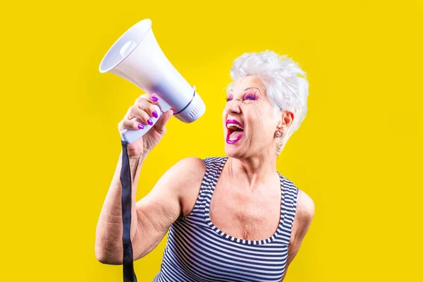 Senior Woman Screaming Loudly Megaphone Yellow Background Elderly Beautiful Grey — Stock Photo, Image
