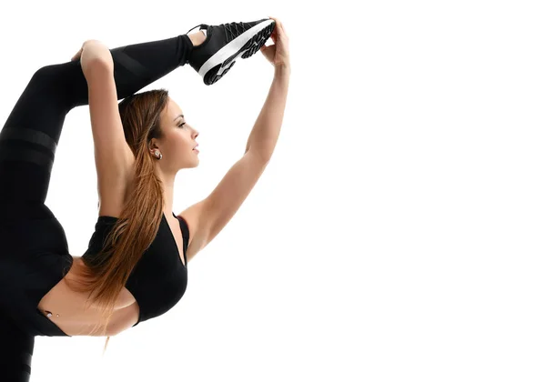 Junge Sportlerin turnt Stretching Fitness-Training isoliert auf einem weißen — Stockfoto