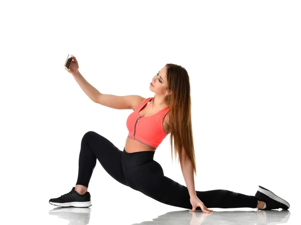 Young sport woman gymnastics doing stretching fitness exercise workout isolated on a white — Stock Photo, Image